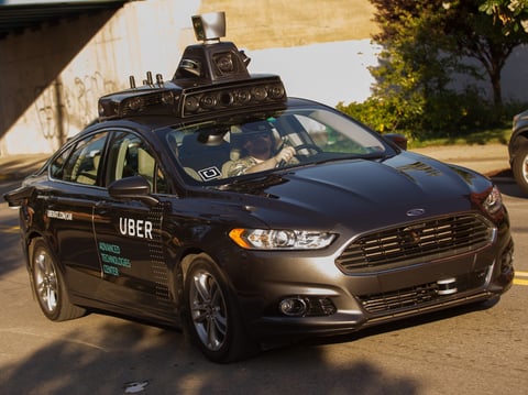 An Uber driverless Ford Fusion drives in Pittsburgh on Sept. 22, 2016. Uber on Monday suspended its self-driving tests after a pedestrian was killed by an autonomous Uber in Tempe, Ariz.
