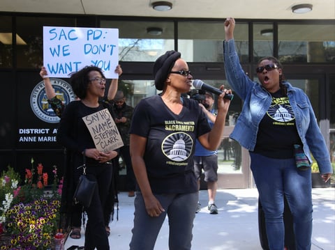 Activists outside the District Attorney's office protesting the shooting of Stephon Clark. 