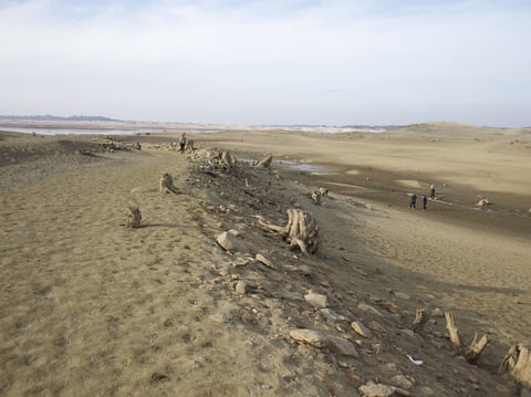 The low lake levels at Folsom Lake reveal a settlement previously submerged.