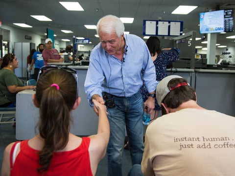 John Cox, Republican candidate for California governor, meets with DMV clients in Sacramento to draw attention to long wait times.