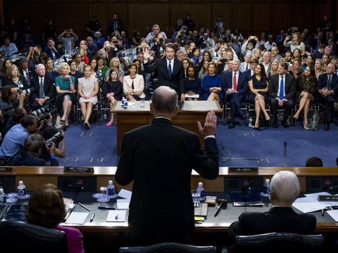 President Donald Trump's Supreme Court nominee, Brett Kavanaugh is sworn-in by Senate Judiciary Committee Chairman Chuck Grassley, R-Iowa, as he appears before the Senate Judiciary Committee on Tuesday, Sept. 4, 2018.