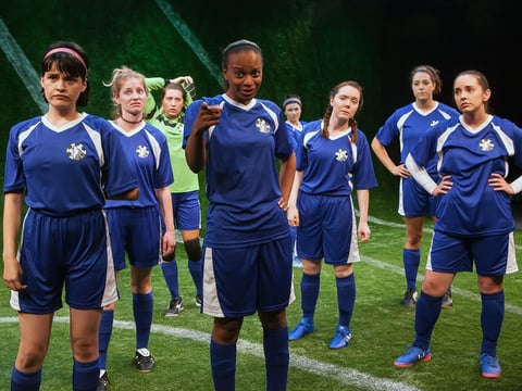 From left to right, Jessica Dahlgren, Ella Dershowitz, Chloe King, Tiffanie Mack, Jasmine Anne Osborne, Leah Daugherty, Payton Gobeille and Jessica Brooks in "The Wolves," at Capital Stage through September 30.