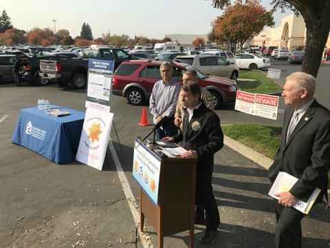 Insurance Commissioner Dave Jones speaks at a press conference, with Rick Lopes of the California Contractors State License Board, Butte County Sheriff Kory Honea and Butte County District Attorney Michael Ramsey.
