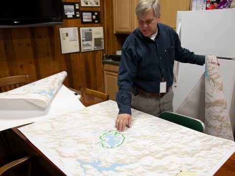 John Gulserian, Program Director for Nevada County OES, shows maps of the region used to plan logistics in fire evacuation.