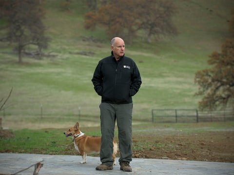 California Gov. Jerry Brown with his dog, Colusa at his ranch home near Williams on Saturday, Dec. 22, 2018.