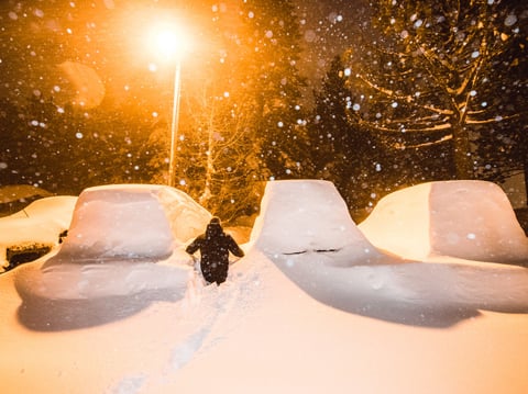 This photo courtesy of Mammoth Mountain shows parked vehicles under a winter storm sweeping in Mammoth Mountain, Calif., early Sunday Feb. 3, 2019.