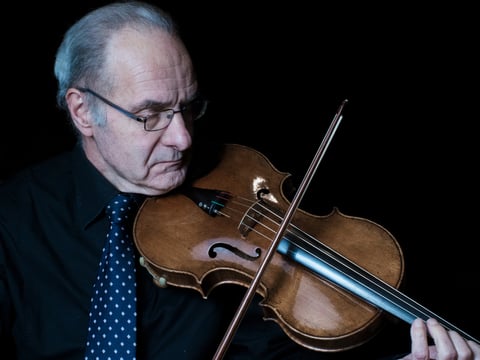 Wim Janssen, one of the musicians involved in the recording project, plays a viola made by master luthier Girolamo Amati in 1615.