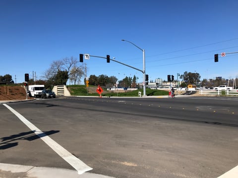 View of the intersection facing the Sac State campus.