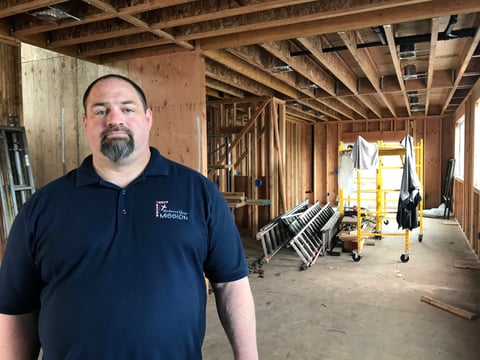 Chris Keys stands inside his Santa Rosa home that is still being constructed. Keys and his family lost their former home in the Tubbs Fire in 2017, and rebuilding has been a slow process.