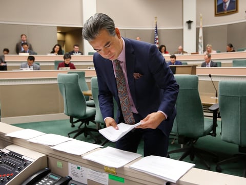 Assemblyman Rob Bonta, D- Alameda, looks over various bills before the Assembly Appropriations Committee, Thursday, May 16, 2019, in Sacramento, Calif.