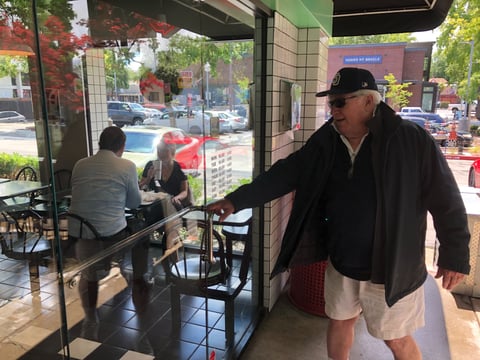 William Taylor, owner of Willie's Burgers, walks into his restaurant on 16th Street in Sacramento.