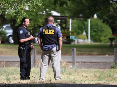 Sacramento police officers continue to work the scene where Officer Tara O'Sullivan was shot on the evening of June 19, 2019.