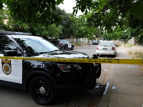 Sacramento police officers continue to work the scene where Officer Tara O'Sullivan was shot on the evening of June 19, 2019.