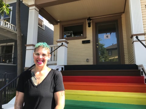 Pixie Pearl, housing director of the Sacramento LGBT Center, standing in front of the new S.T.E.P. housing facility for LGBT youth.