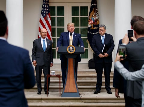 President Donald Trump, joined by Commerce Secretary Wilbur Ross, left, and Attorney General William Barr, speaks during an event about the 2020 census in the Rose Garden at the White House in Washington, Thursday, July 11, 2019.
