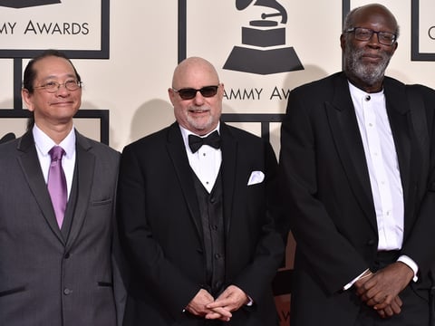 Wayne Wallace, right, and the Wayne Wallace Latin Jazz Quintet arrives at the 58th annual Grammy Awards at the Staples Center on Monday, Feb. 15, 2016, in Los Angeles.