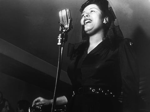 Billie Holiday sings at a Sunday afternoon jam session.