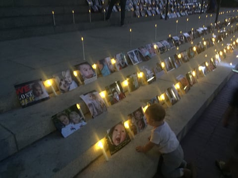 Two days after Gov. Gavin Newsom approved a new vaccine law, a small group of protesters held a candlelight vigil at California's Capitol.