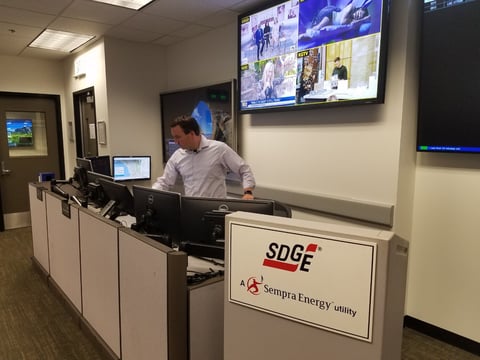 Brian D'Agostino, SDG&E’s Director of Fire Science and Climate Adaptation, scans the monitors at the utility’s operations center, Oct. 18, 2019.