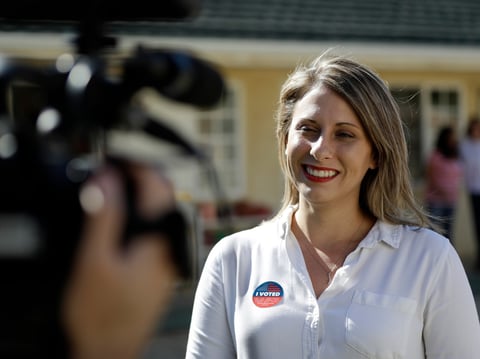 Katie Hill, a Democratic Party candidate from California's 25th congressional district conducts an interview after voting Tuesday, Nov. 6, 2018, in Agua Dulce, Calif. Hill is running against Republican incumbent Steve Knight.
