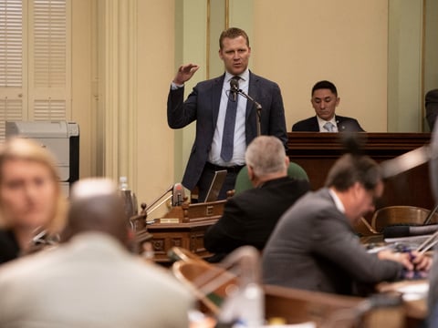 Assemblyman Chad Mayes speaks in opposition to a statewide rent control bill subsequently signed by Gov. Gavin Newsom, September 11, 2019. Mayes is the latest Republican to leave the party in this heavily Democratic state.