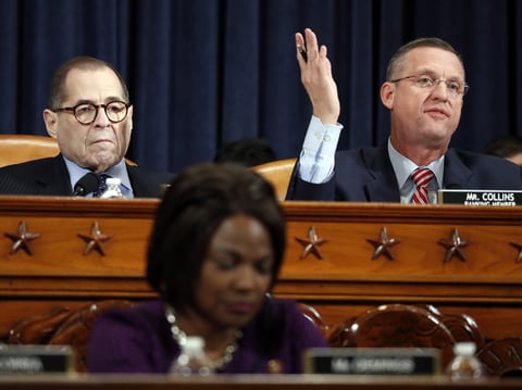 House Judiciary Committee ranking member Rep. Doug Collins, R-Ga., right, gives his opening statement during a House Judiciary Committee markup of the articles of impeachment against President Donald Trump on Wednesday.