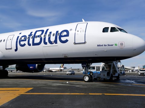 FILE- In this March 16, 2017, file photo, a Jet Blue airplane at John F. Kennedy International Airport in New York.