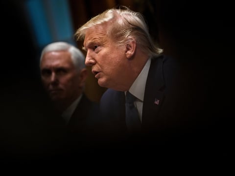President Trump addresses a Cabinet meeting last month at the White House, as Vice President Pence looks on in the background.