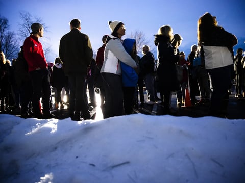 People wait in line to enter an event for Democratic presidential candidate former South Bend, Ind., Mayor Pete Buttigieg Monday.
