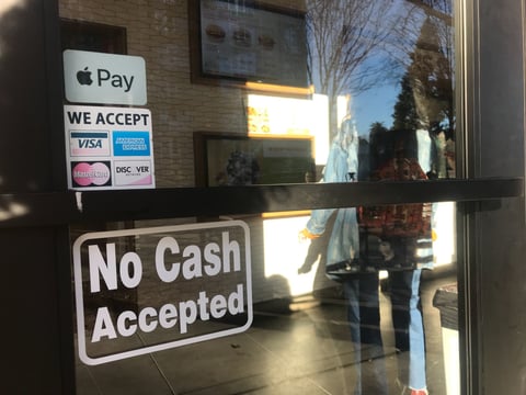 Burger Patch hasn't taken down the "No Cash Accepted" sign on its front door, even though it begin accepting cash about a month after opening last May. The vegan burger joint is still "card-preferred," said employee Zia Simmons.