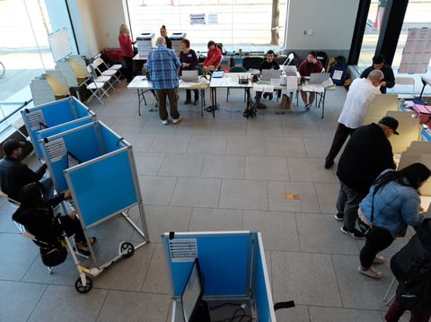 Voters cast their ballots at the California Museum vote center March 3, 2020.