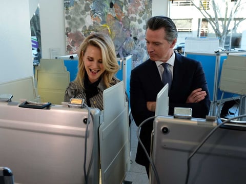First Partner Jennifer Siebel Newsom and California Gov. Gavin Newsom cast their votes at the California Museum vote center in Sacramento March 3, 2020.