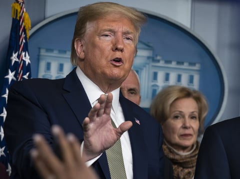 Treasury Secretary Steven Mnuchin listens as President Donald Trump speaks during a press briefing with the coronavirus task force, at the White House on Tuesday.