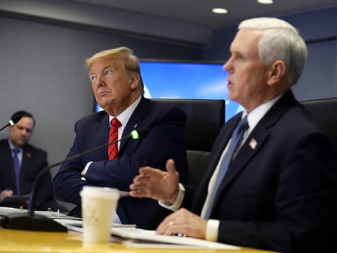 President Trump and Vice President Pence attend a teleconference with governors at the Federal Emergency Management Agency headquarters on Thursday.