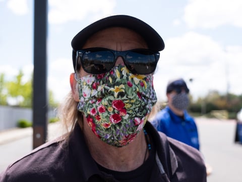 Dave Chappell, a Sacramento Food Bank and Family Services employee, wears a cloth mask at Encina High School on Tuesday, April 7, 2020.