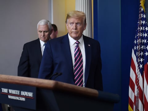 President Trump is seen with Vice President Pence in the Brady Briefing Room of the White House on Friday.