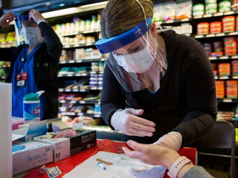 A COVID-19 antibody testing center is seen at Steve's 9th Street Market in Brooklyn on April 25. Here's a quick guide to sorting out the pluses and minuses to each type of test.
