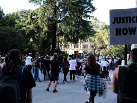 Demonstrators gather at Cesar Chavez Plaza Monday, June 1, 2020.