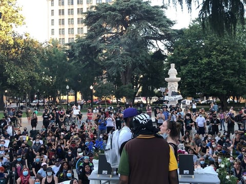 Demonstrators gather at Cesar Chavez Plaza Tuesday, June 2, 2020.