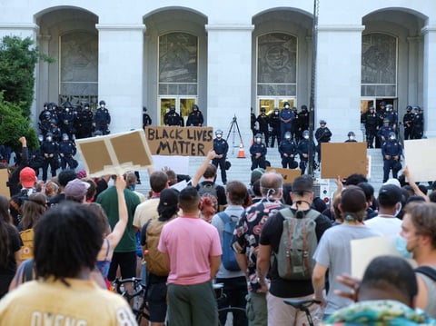 Demonstrators at the east steps of the California State Capitol in Sacramento on June 3, 2020 protest the killing of George Floyd by Minneapolis police.