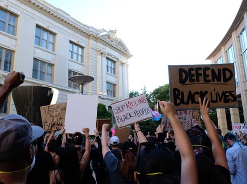 Demonstrators with Black Lives Matter gather outside Sacramento City Hall to demand changes to the city's police department.