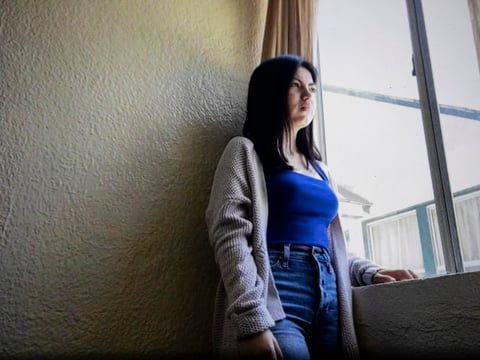 UCLA student Dulce Jimenez at her boyfriend’s apartment, where she often goes to study. Jimenez is one of a growing number of California students appealing their financial aid packages due to pandemic-related expenses.