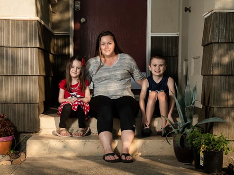 Kyla Hill, 5, left, Rebecca Hill, center, and Kaden Hill, 7, right, sit for a portrait at their home in Chico on July 23, 2020.