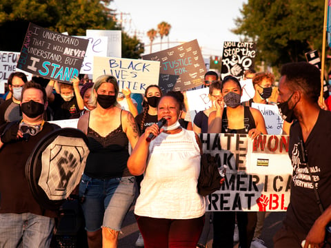Tanya Faison of Black Lives Matter Sacramento leads protesters on a march down Richards Boulevard in Sacramento on Aug. 1, 2020, demanding police reform in the wake of nationwide demonstrations against police brutality.