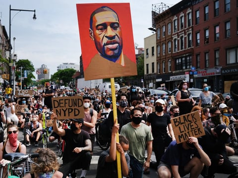 Protesters march in downtown Brooklyn over the killing of George Floyd by a Minneapolis Police officer on June 5, 2020 in New York City.