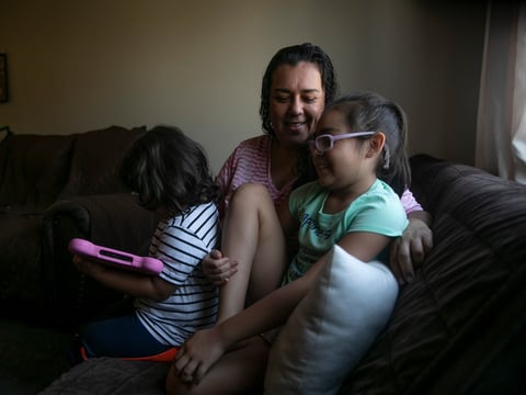 Mariana with her children on September 7, 2020. The family of four shares a one-bedroom apartment in National City but have fallen behind on rent payment due to Mariana and her husband both losing months of work amid the pandemic.