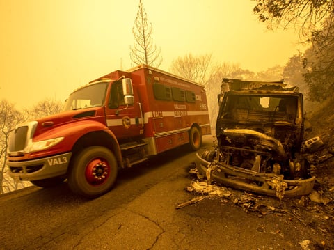 A camp crew truck was destroyed on Stringtown Rd. in a Thursday evening flare-up which burned over the truck in the Bear fire on Sept. 11, 2020 in Oroville, Calif.