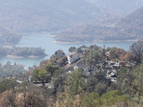 Homes destroyed by the LNU Lighting Complex Fire are interspersed with untouched homes above Lake Berryessa, a resort area and water supply reservoir, on Sept. 21, 2020.
