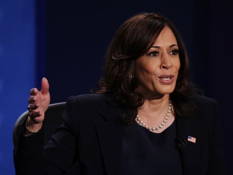 Democratic vice presidential nominee and California Sen. Kamala Harris, seen here during the Oct. 7 vice presidential debate, is postponing in-person campaign events after two people traveling with her tested positive for the coronavirus.