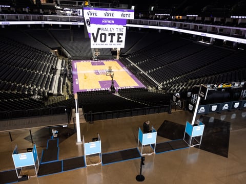 A voter uses a touchscreen at the Golden1 Center in Sacramento, Saturday, Oct. 24, 2020.